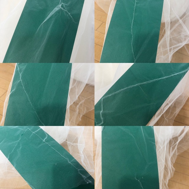 一枚目補修の画像です。チュールが重なるので外観からは判別しにくい状態です。内側などにも補修がありますが使用には影響ない場所です。